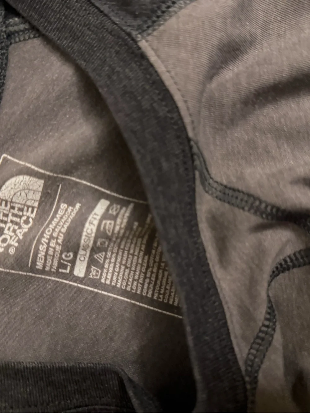 North Face shirt with two toned gray in men’s size Large